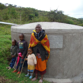 people by a new rainwater tank