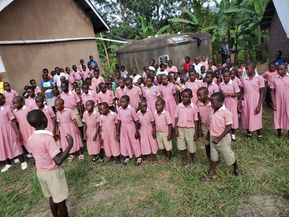 group of students dressed in pink