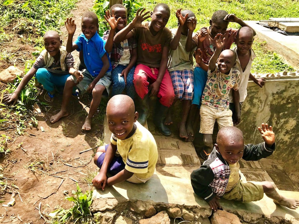 group of children waving